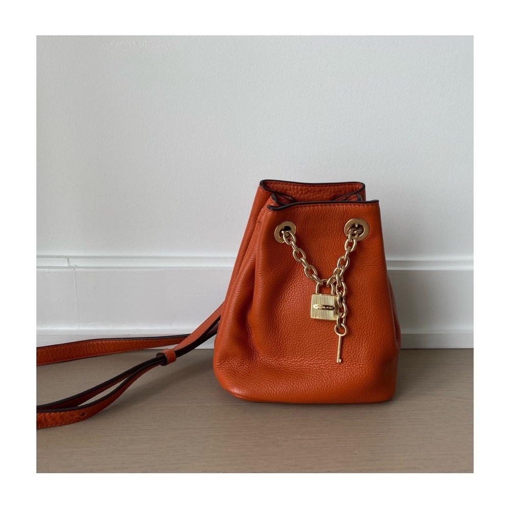 Michael Kors gold-chained mini crossbody bucket bag, Orange